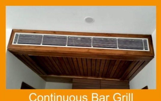 Continuous bar grill AC diffuser in wooden ceiling